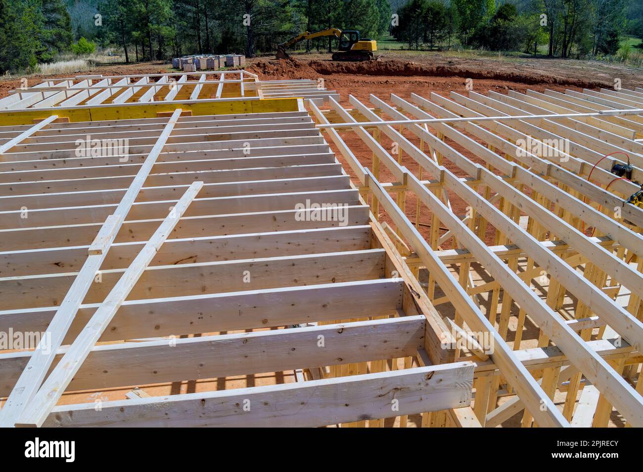 Framing beam provides structural support layout of joists to new built wooden home Stock Photo