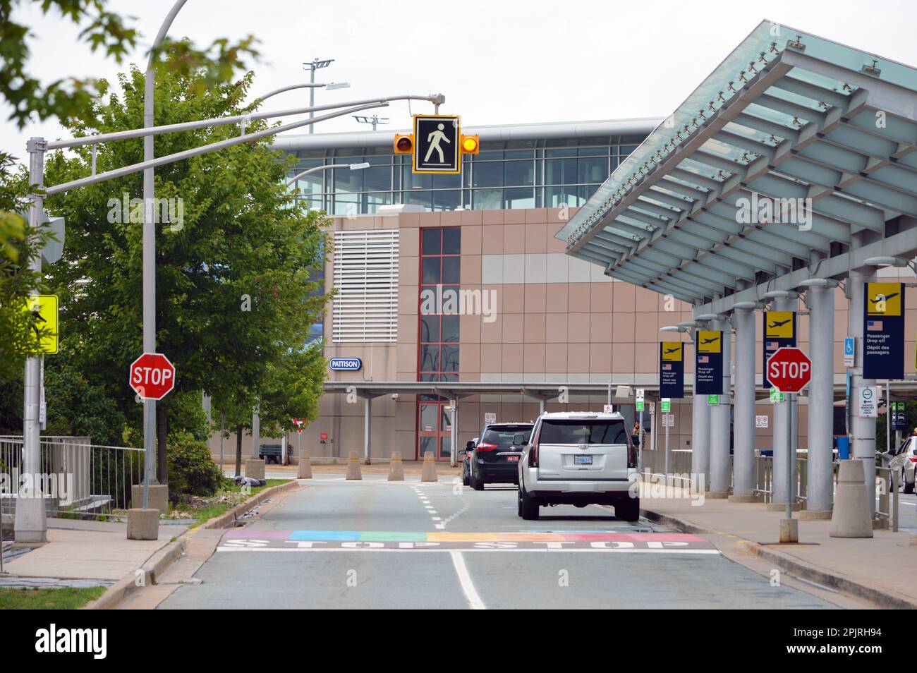 Raised pedestrian crossing, painted in rainbow colours, at Halifax Stanfield International Airport in Nova Scotia, Canada (2022) Stock Photo