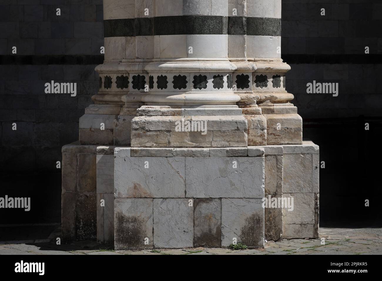 Column base of the incomplete extension of the Duomo of  Siena Stock Photo