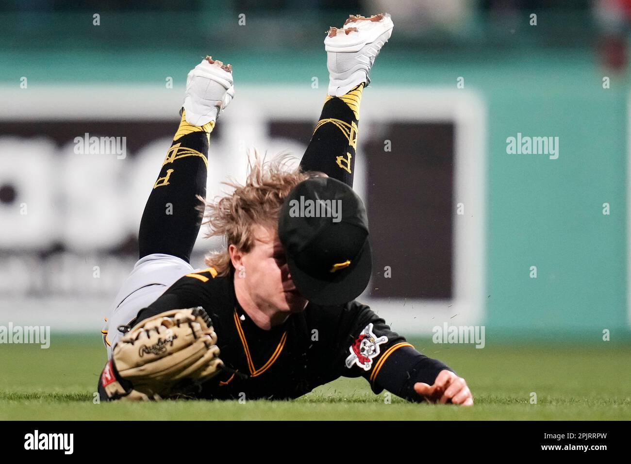 Pittsburgh Pirates right fielder Jack Suwinski loses his cap while making  the catch on a fly out by Boston Red Sox's Enrique Hernandez during the  fourth inning of a baseball game at