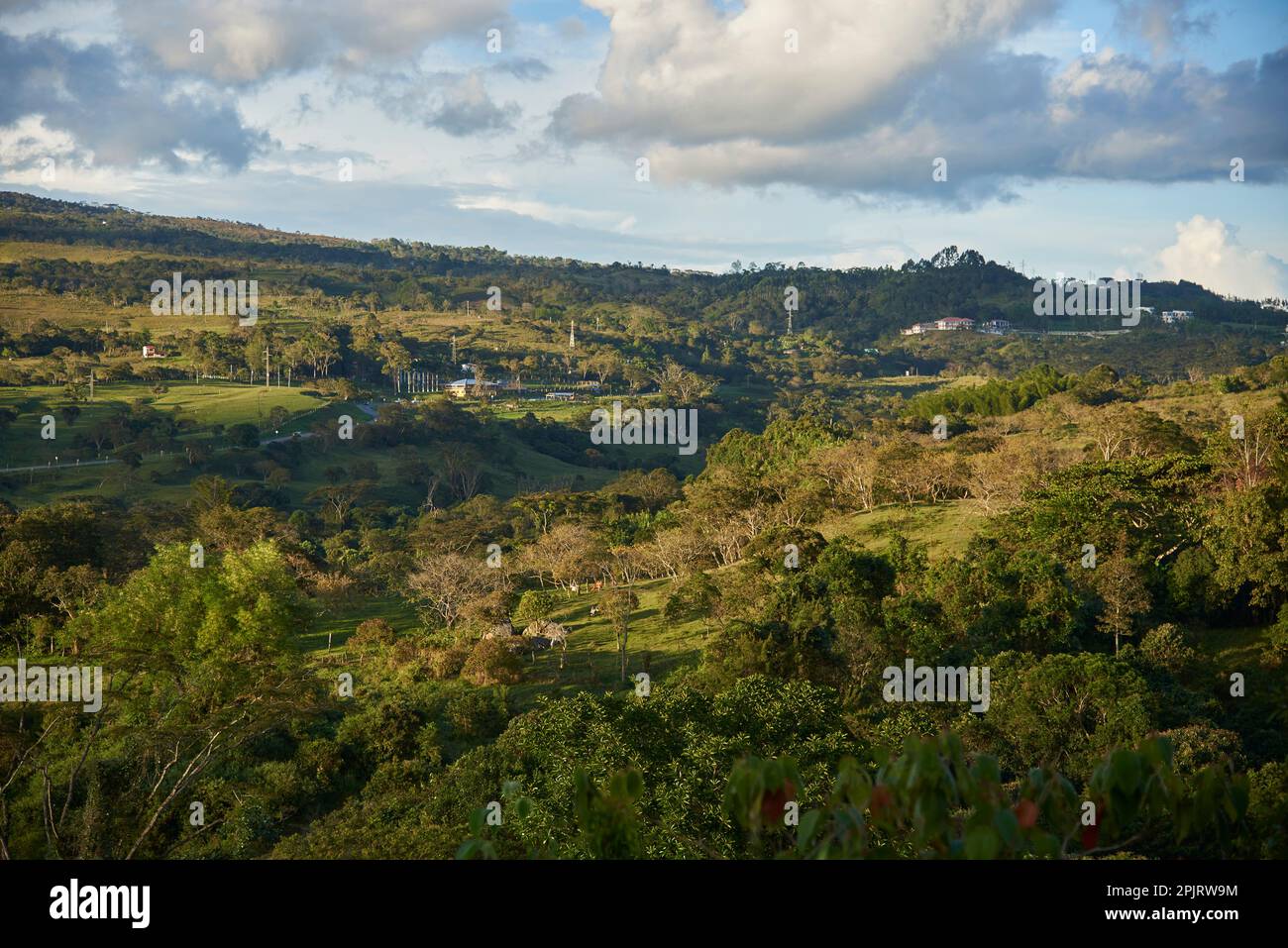 View of the mountainous landscape from a hill near Puente Nacional, Santander, Colombia at sunset. Stock Photo
