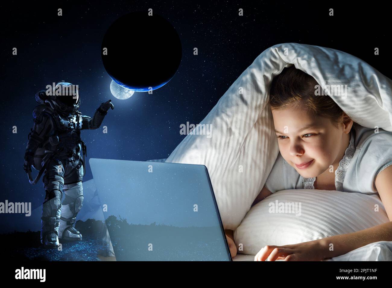 Little girl in front of computer Stock Photo - Alamy