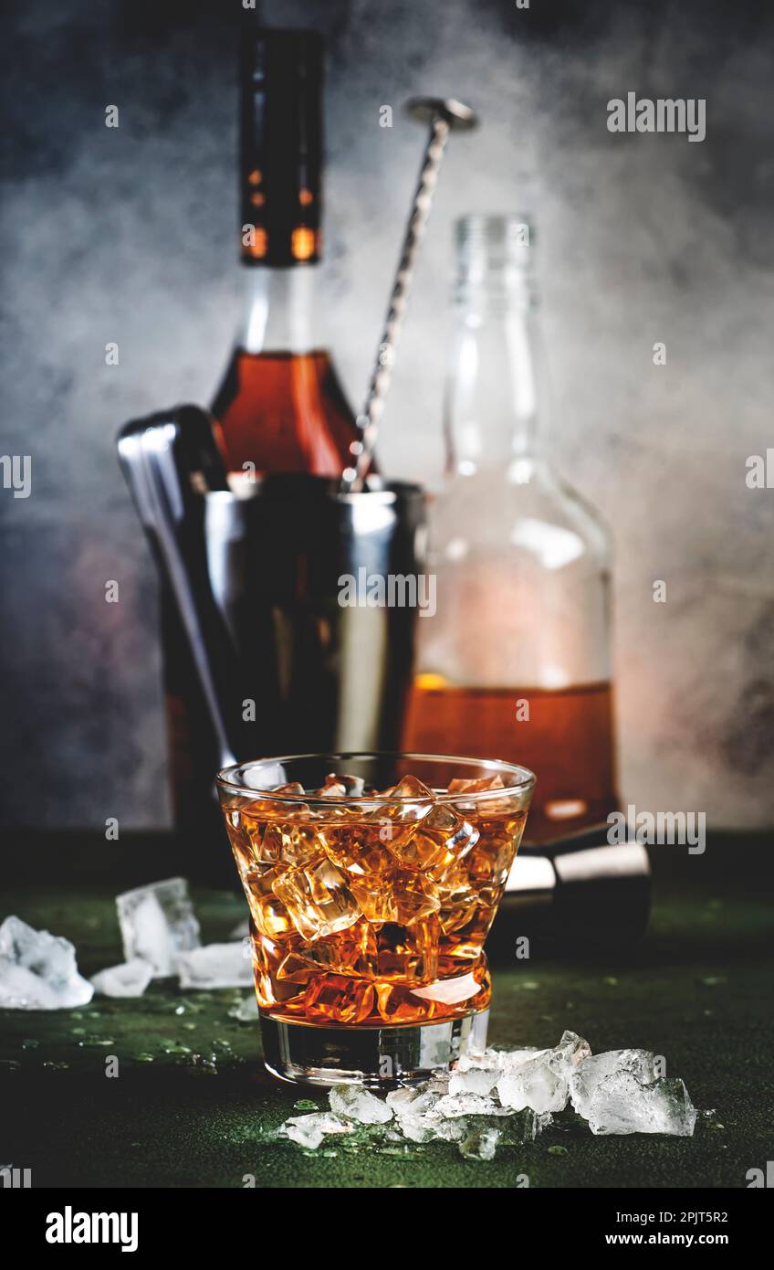 Godfather boozy cocktail with scotch whiskey, amaretto liqueur and ice