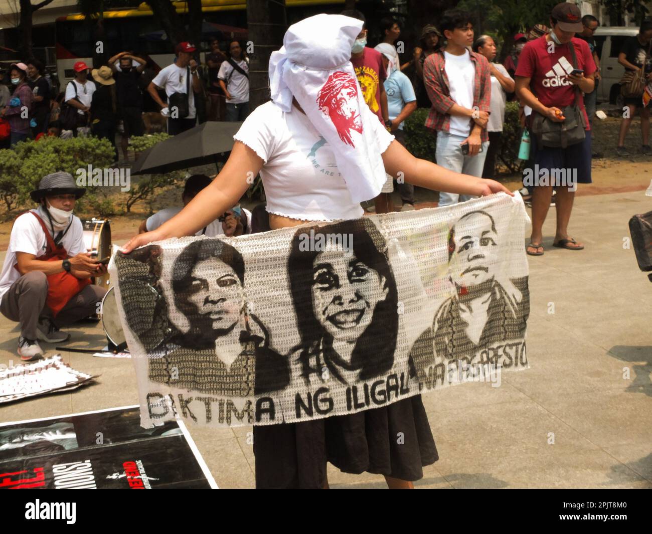 Manila, Philippines. 03rd Apr, 2023. A female activist holds printed ...