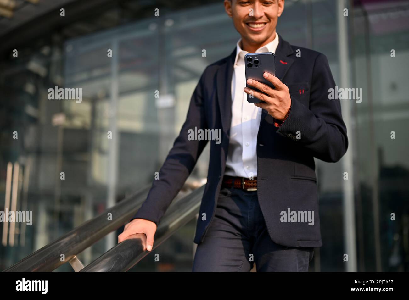 Handsome and successful millennial Asian businessman in a formal ...