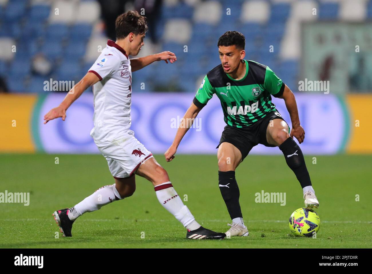 Abdou Harroui of U.S. Sassuolo Calcio in action during the Serie A match between U.S. Sassuolo Calcio and Torino F.C. at Mapei Stadium-Citta del Trico Stock Photo