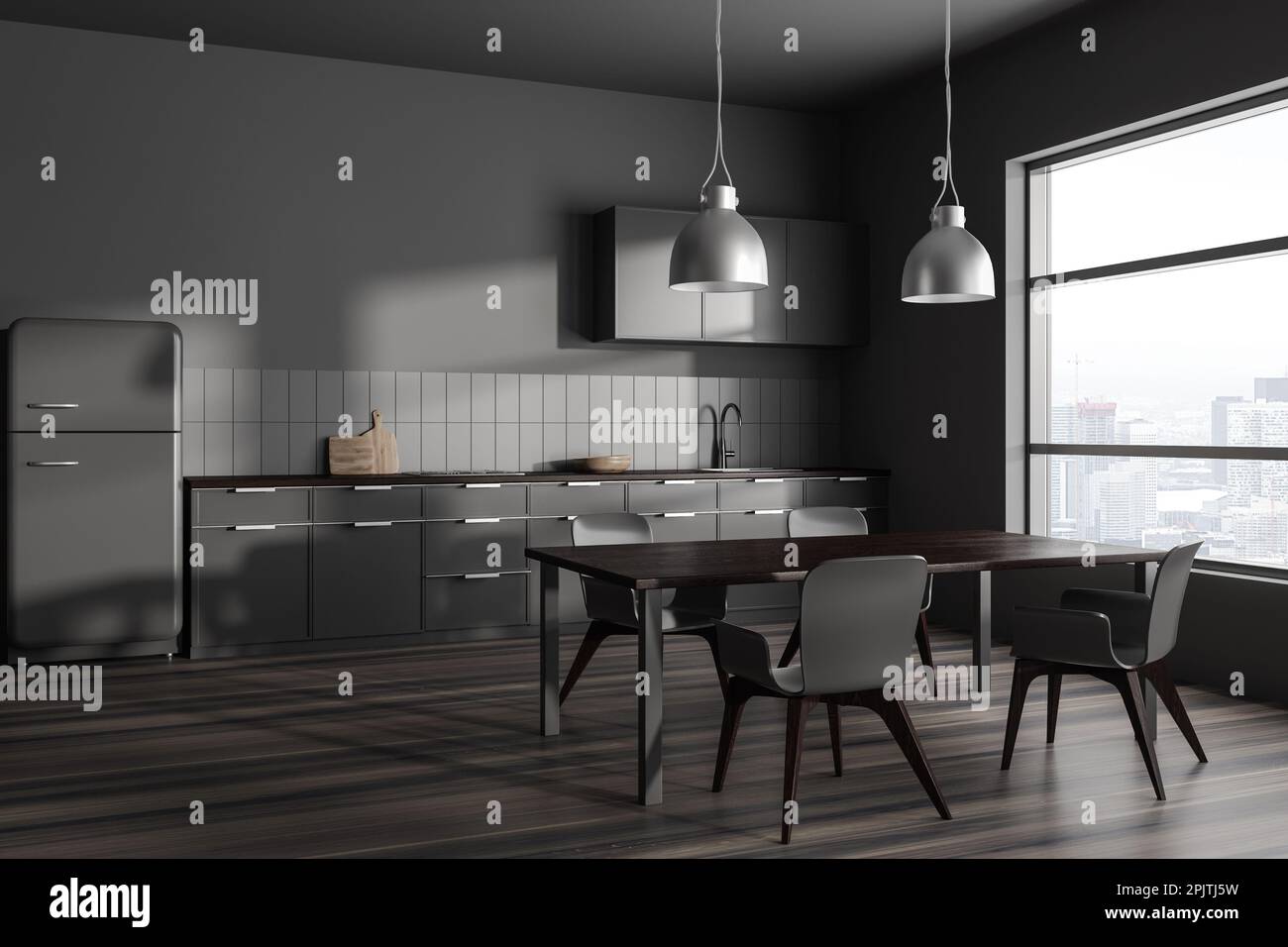 Corner of stylish kitchen with gray walls, dark wooden floor, gray