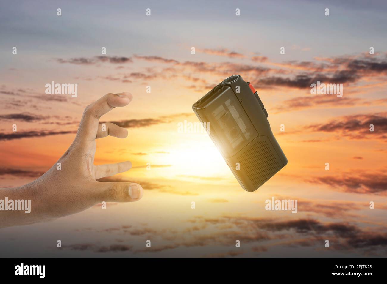 A human hand trying to reach a recording device. World press freedom ...