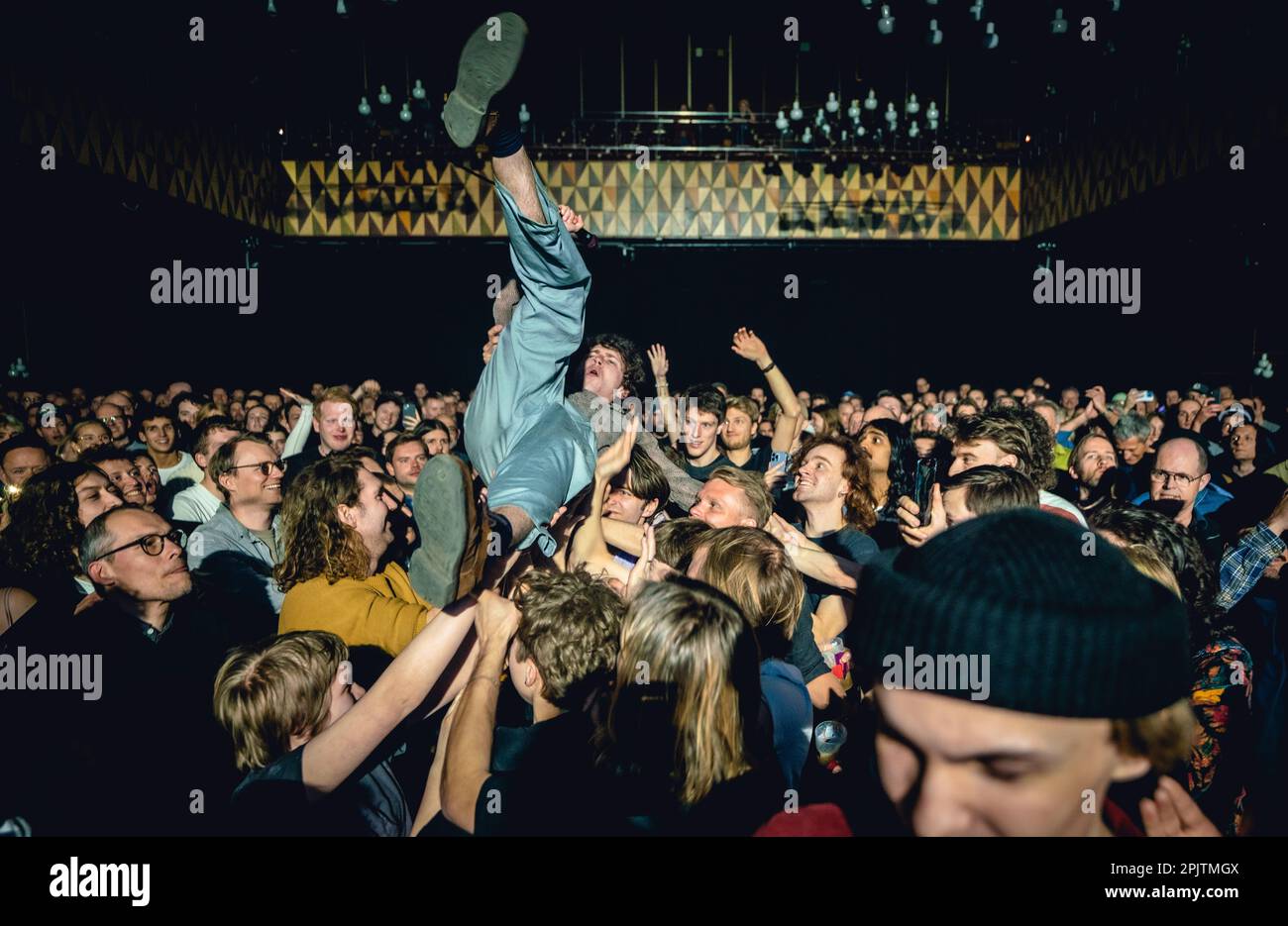 Copenhagen, Denmark. 01st, April 2023. The English post-punk band Shame performs a live concert at VEGA in Copenhagen. Here vocalist Charlie Steen is seen crowd surfing. (Photo credit: Gonzales Photo - Joe Miller). Stock Photo