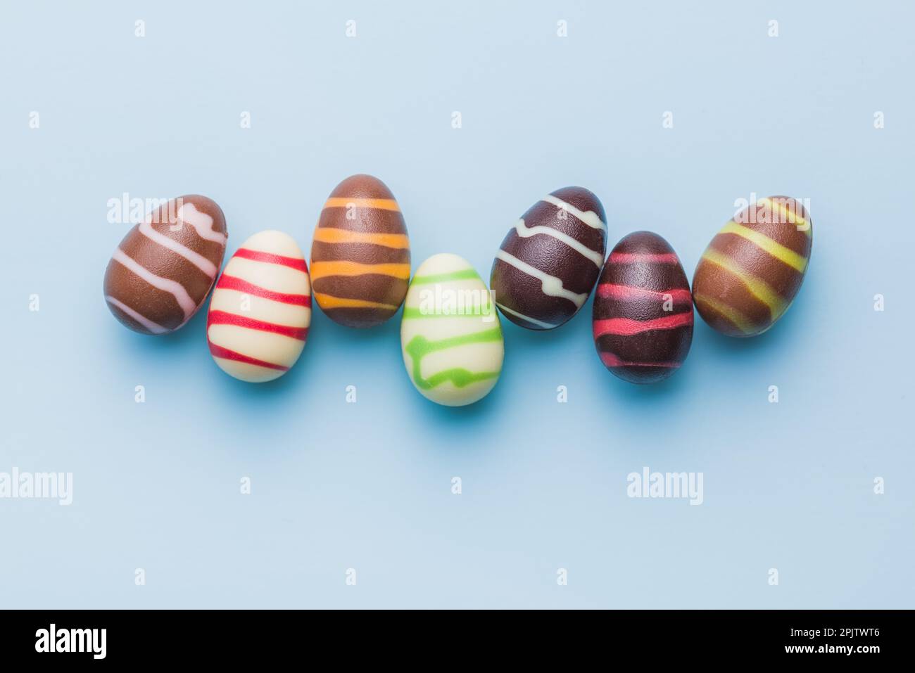 Chocolate easter egg with the top broken off Stock Photo - Alamy