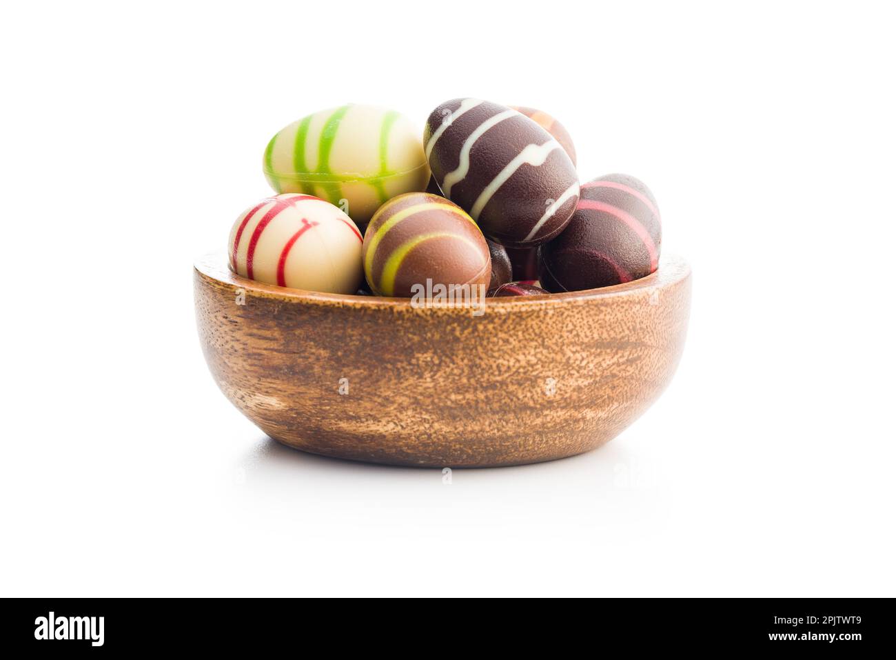 Chocolate easter eggs in bowl isolated on the white background. Stock Photo