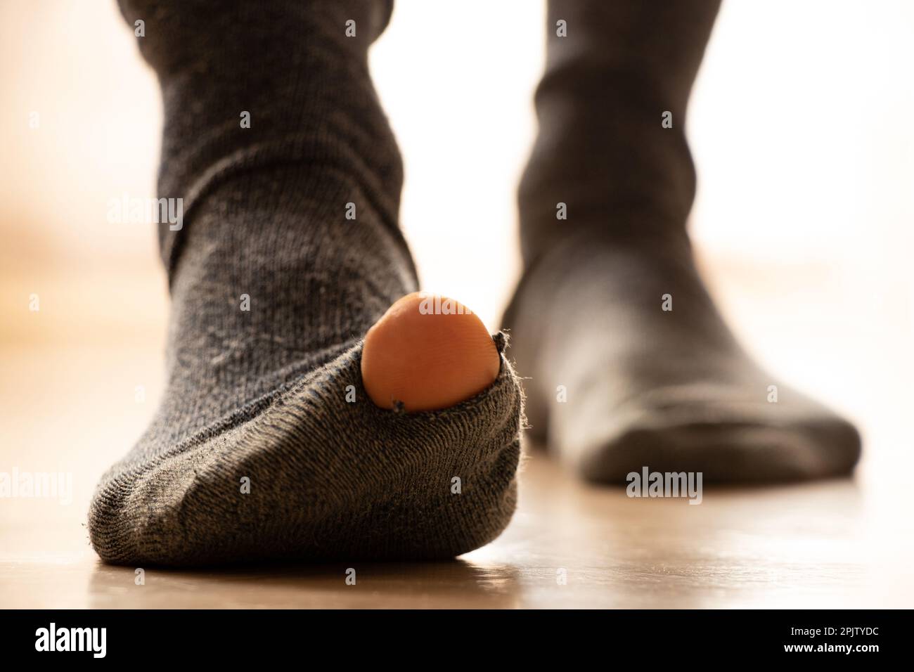 Holey in socks hi-res stock photography and images - Alamy