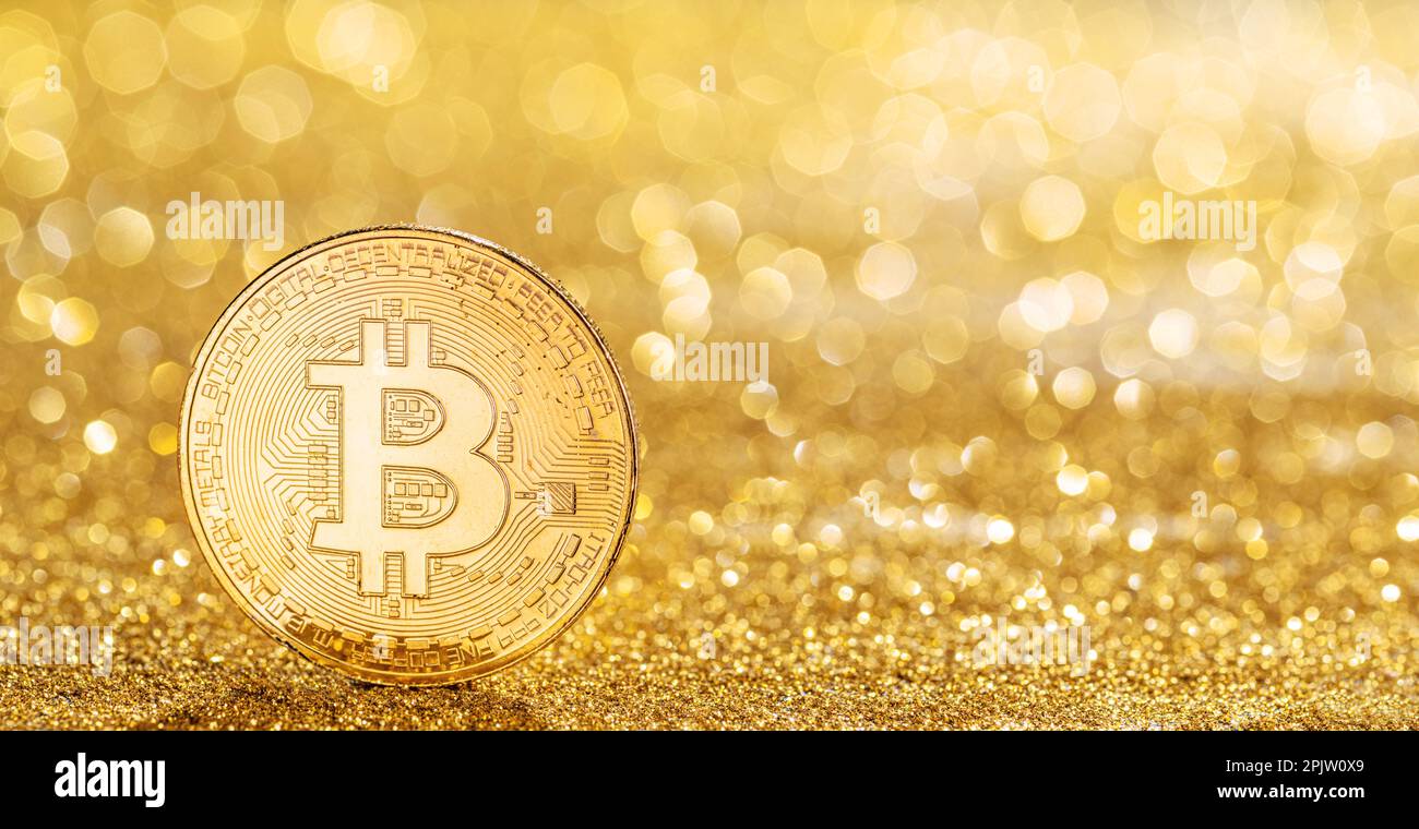 Gold bitcoin coin at the blazing gold background. Conceptual picture of  digital money Stock Photo - Alamy