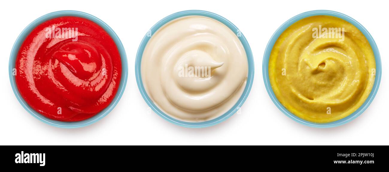 Ketchup, mustard and mayonnaise sauces on ceramic blue bowl on white