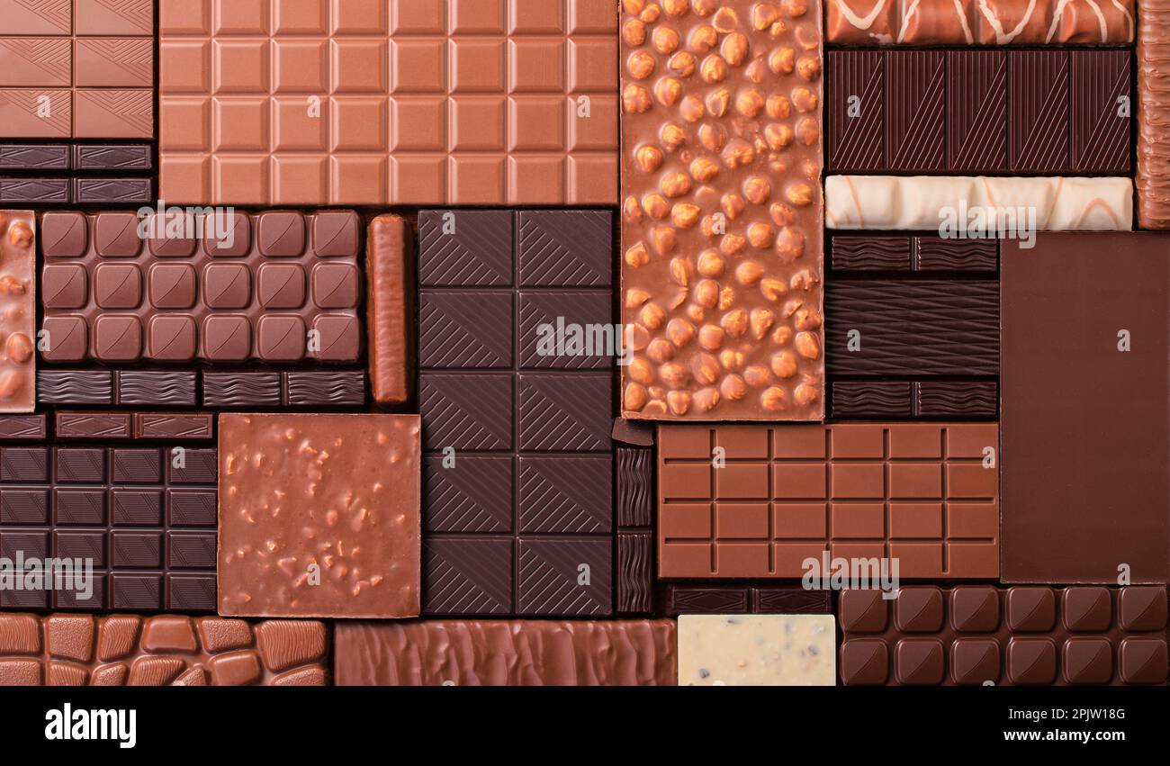 Mix delicious natural cocoa chocolates, top view. Stock Photo