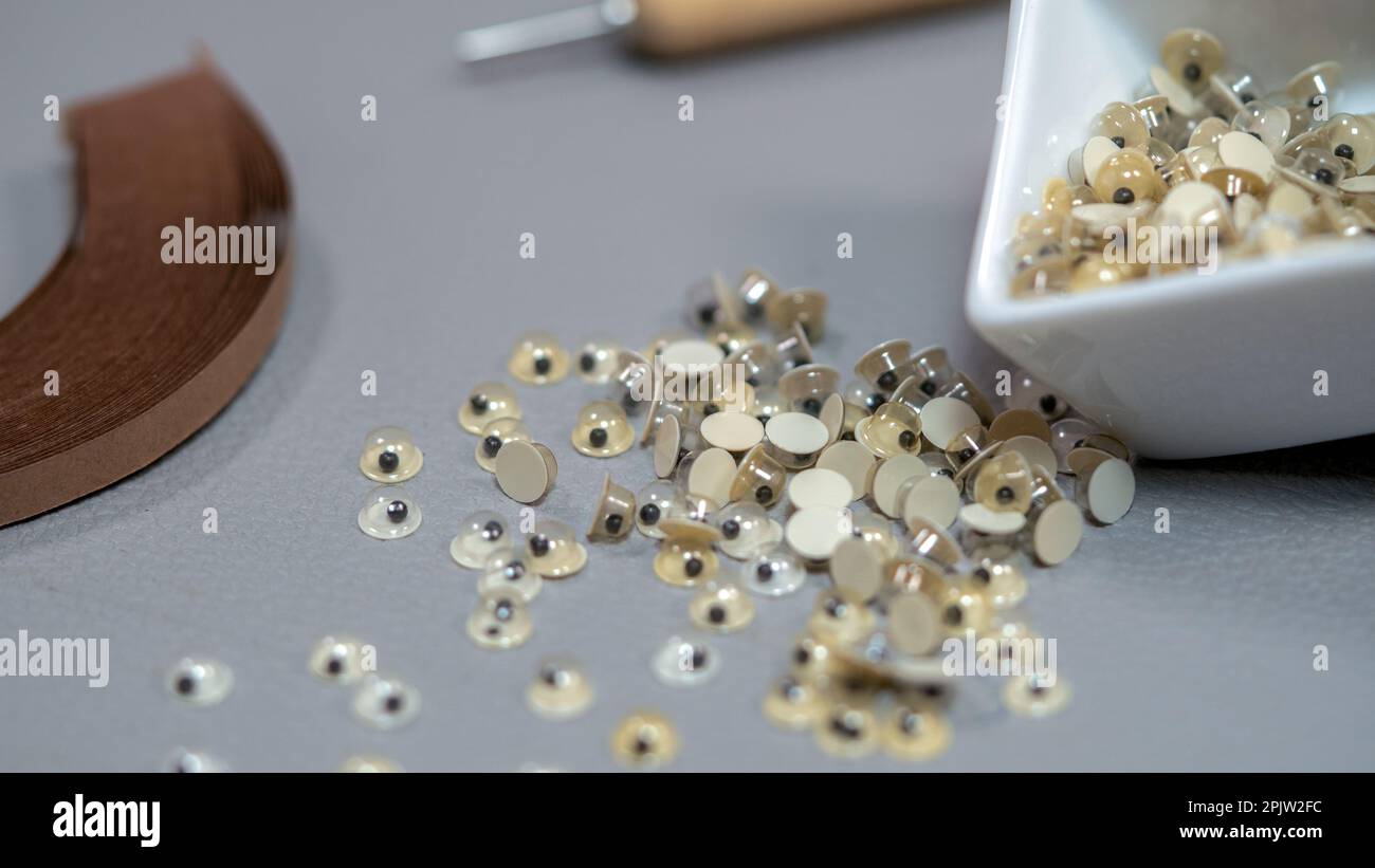 Large Googly Eyes on a Wood Desk Stock Photo - Image of view