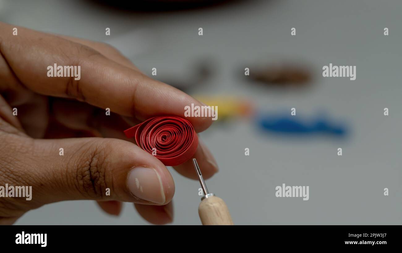 skein with a brown rope, roll with holiday wrapping paper