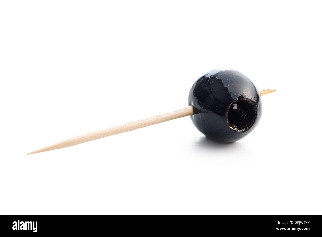 Pitted black olive isolated on the white background. Stock Photo