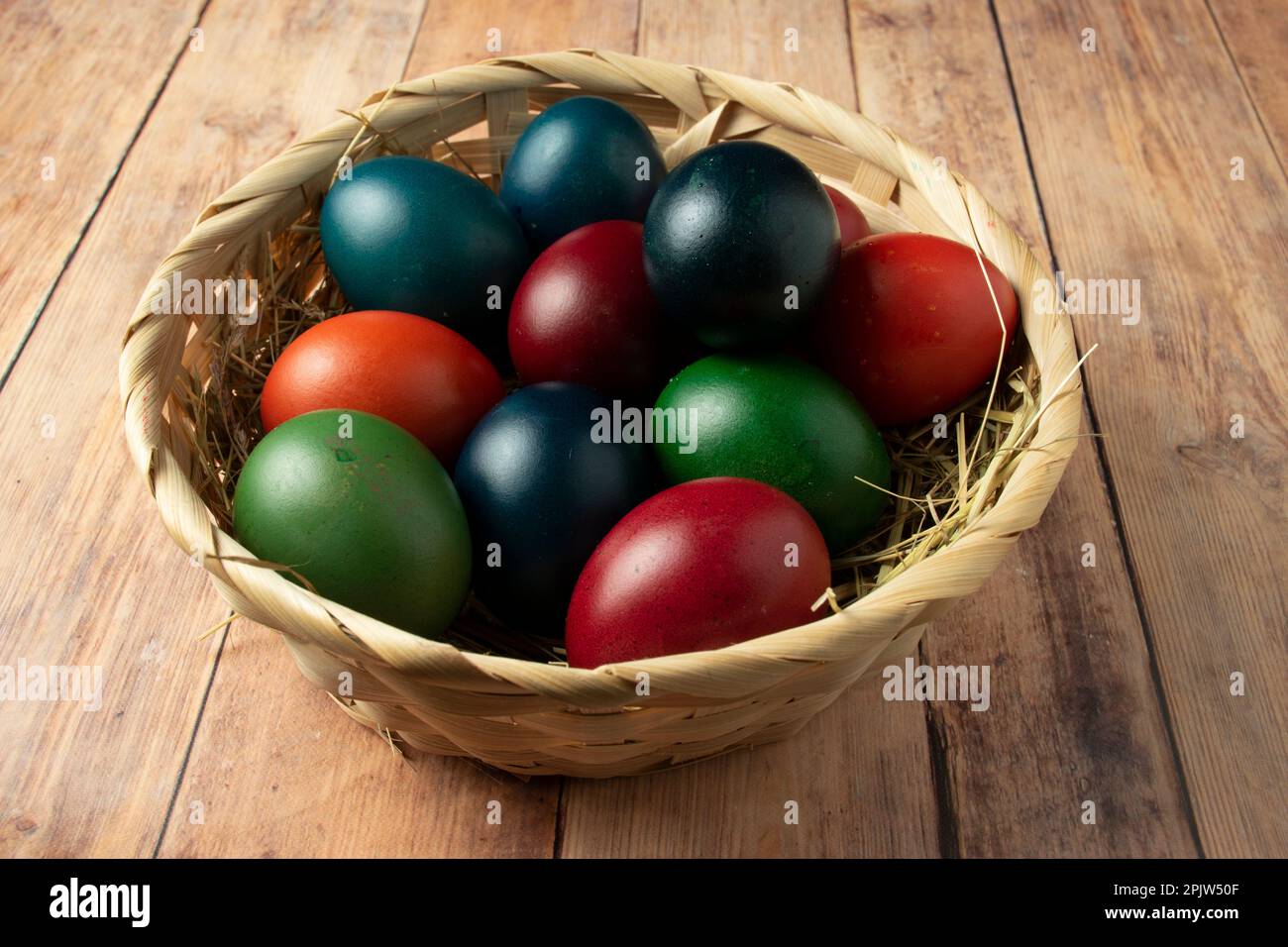 Easter eggs in a basket Stock Photo