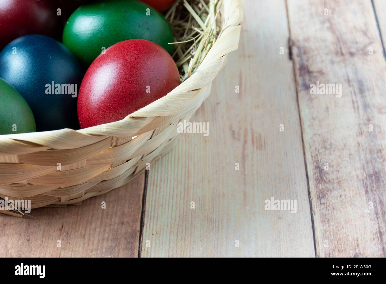 Easter eggs in a basket Stock Photo