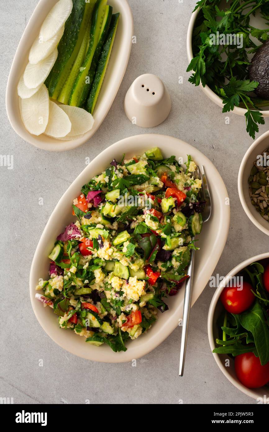 Healthy lunches, millet porridge or quinoa with mixed salad, tomatoes