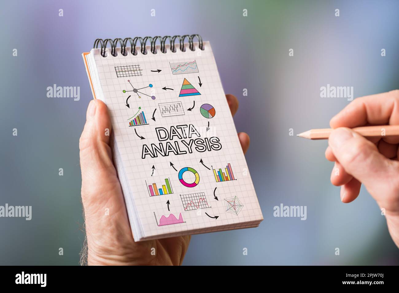 Hand drawing data analysis concept on a notepad Stock Photo - Alamy