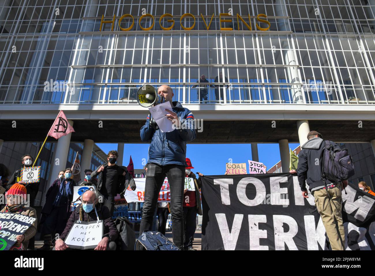 Velsen Noord/IJmuiden,The Netherlands. 03 Apr 2023.  Climate activists organized a 'die-inn' and a blockade at the entrance of steel manufacturer Tata steel to protest pollution and the usage of coal. Stock Photo