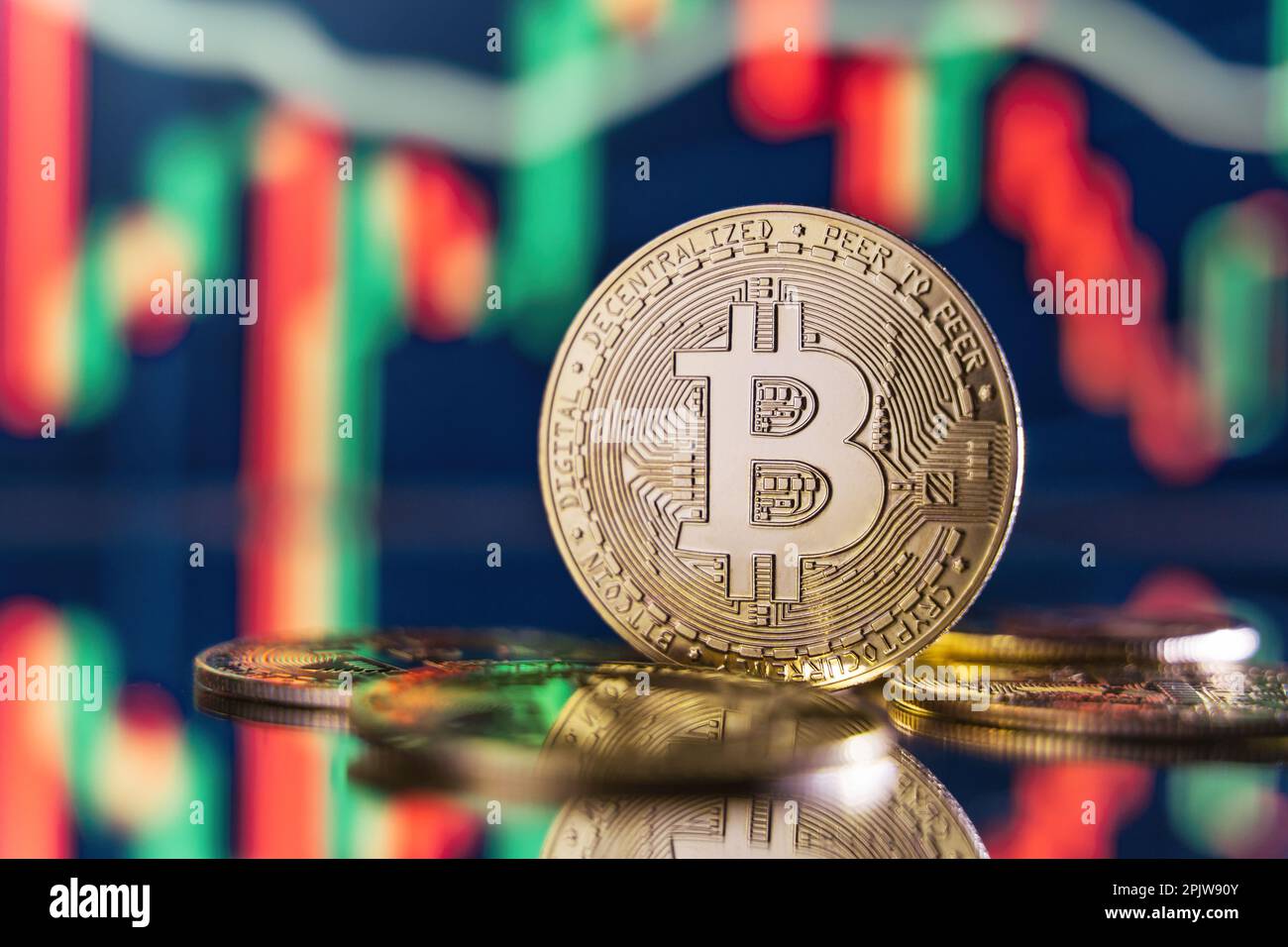 Cryptocurrency trading market. Image of golden bitcoin on background with  digital chart of unstable crypto prices, red and green candlesticks  changing their directions up and down Stock Photo - Alamy