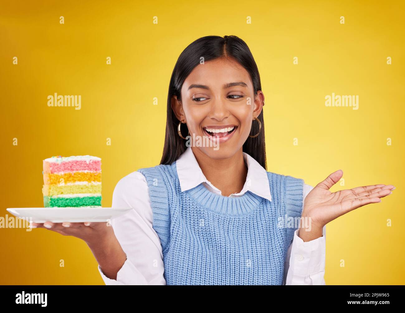 Birthday, smile and woman with cake in studio for happy celebration or