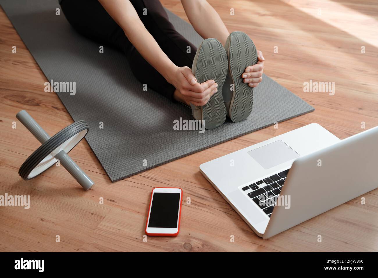 Coach conducting virtual fitness classes hi-res stock photography and ...