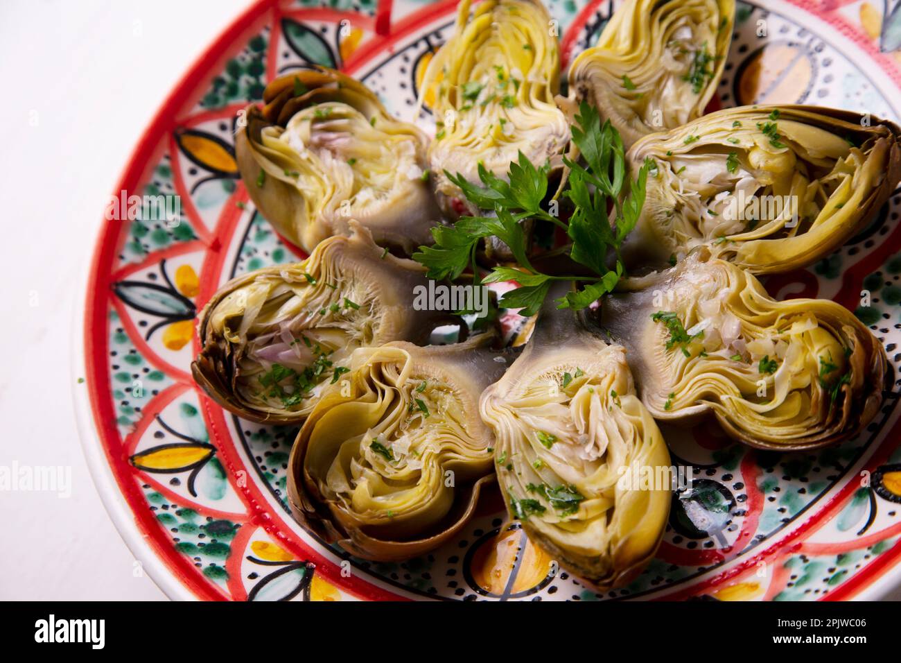 Baked artichokes with salt. Traditional Spanish recipe Stock Photo Alamy