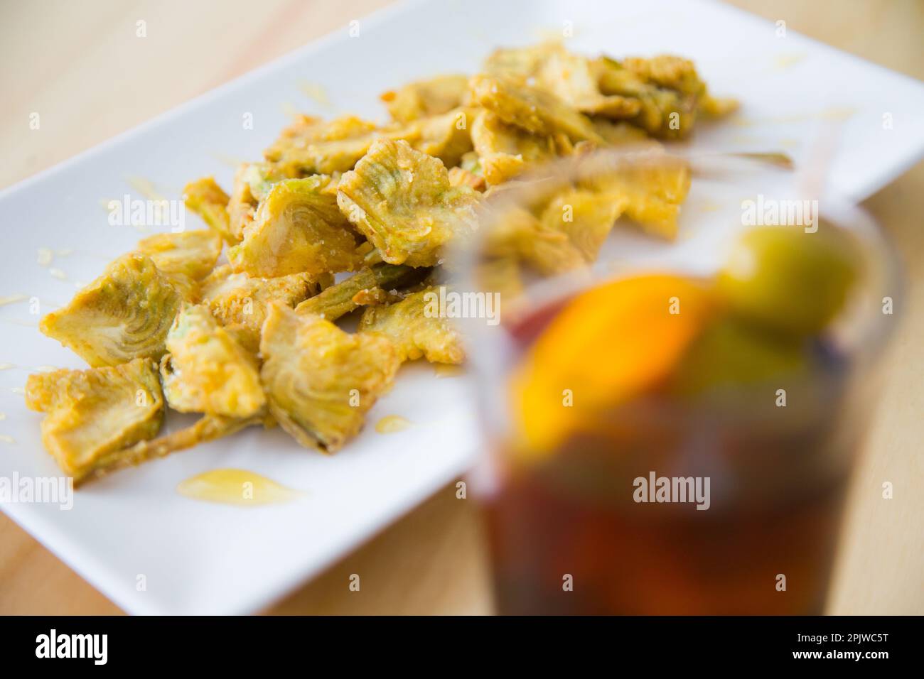 Dish with battered artichokes. Traditional Spanish tapa Stock Photo Alamy