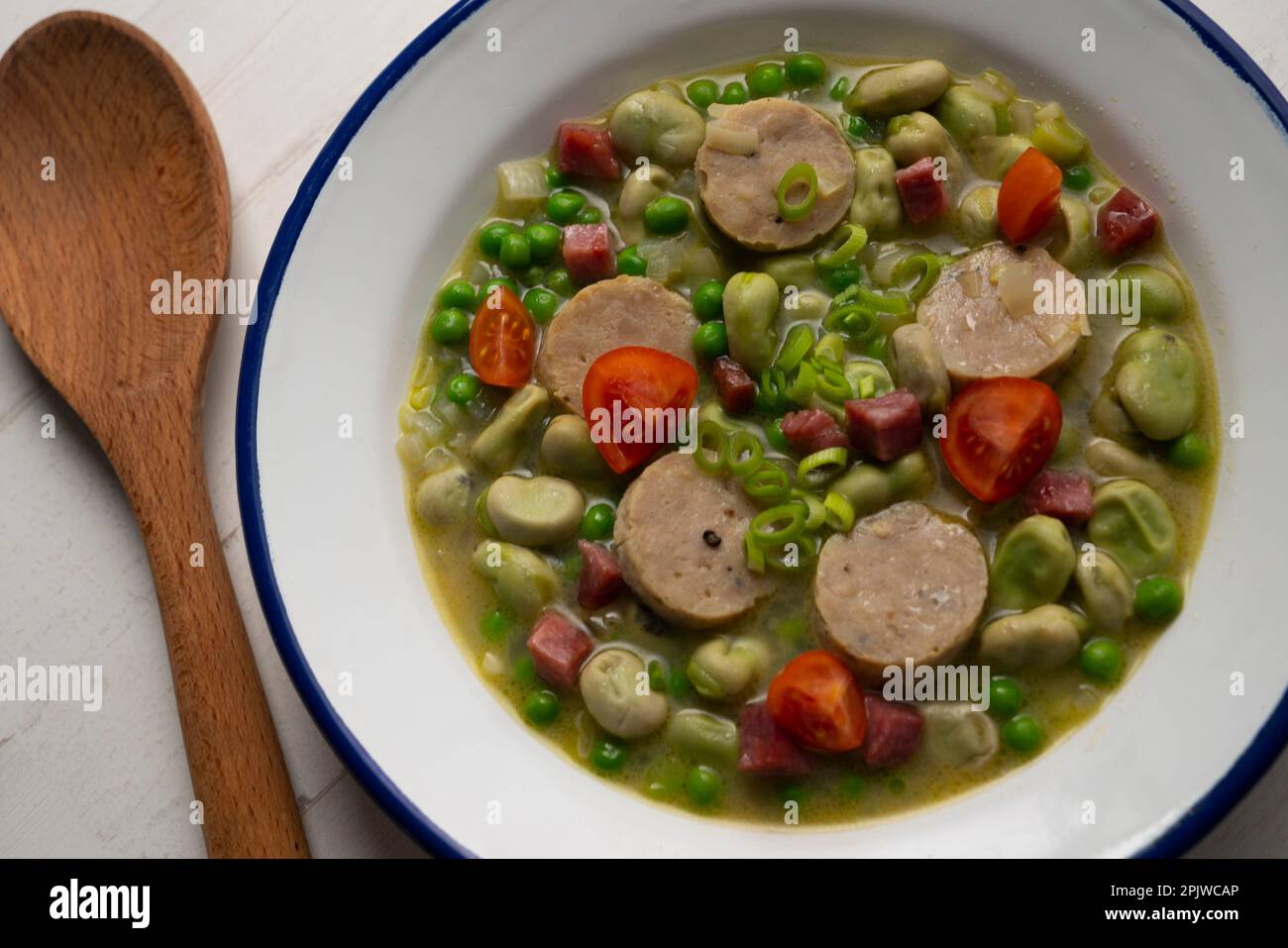 Bean stew with ham and black pudding. Traditional Spanish tapa recipe Stock Photo Alamy