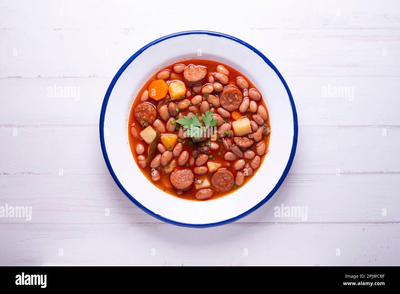 White bean stew with chorizo. Traditional Spanish recipe from north