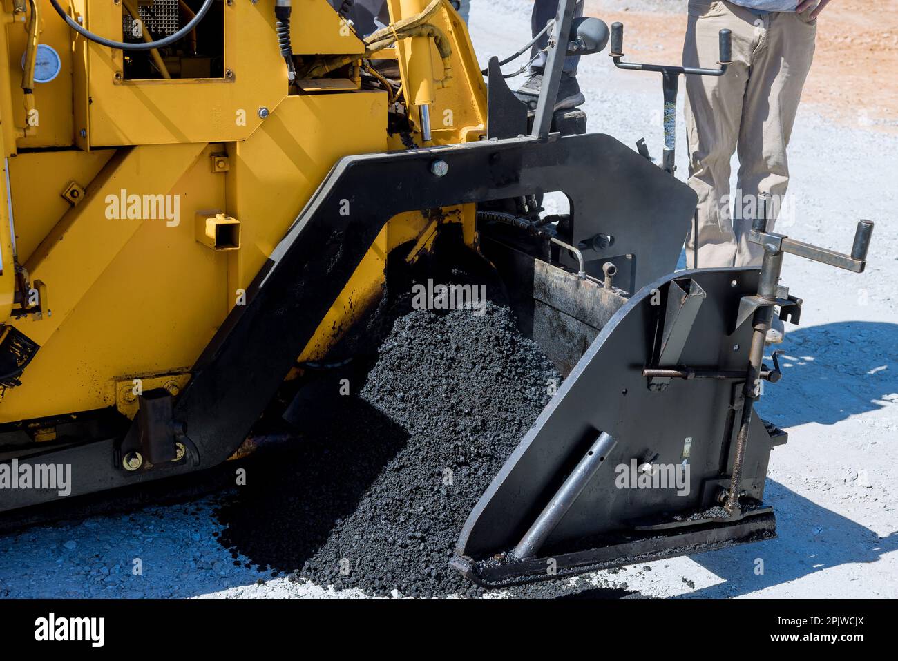 Performance asphalt pavers steam road rollers during one of stages road