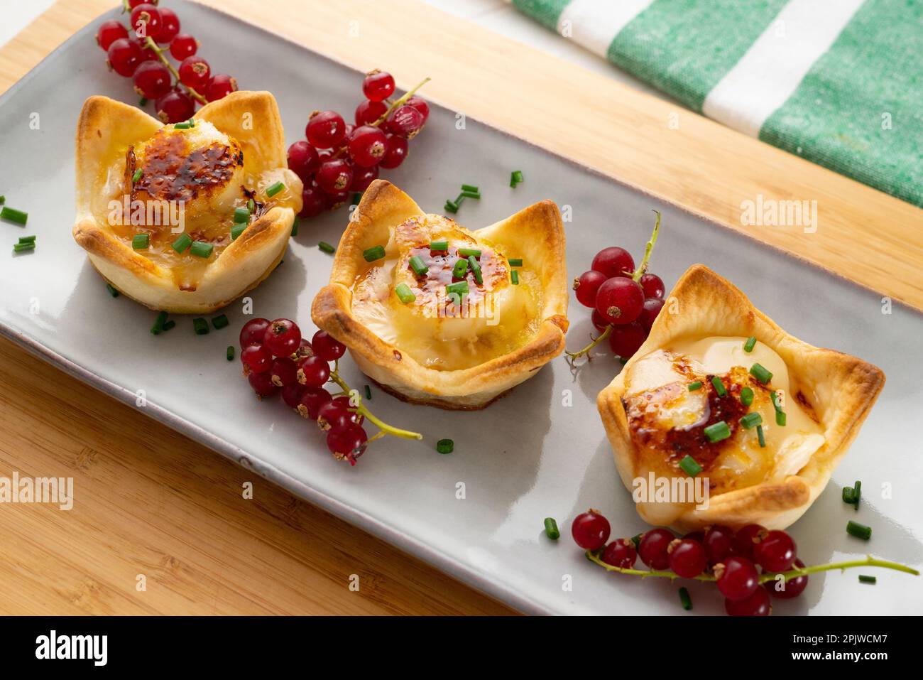 Goat cheese appetizers on shortcrust pastry Stock Photo Alamy