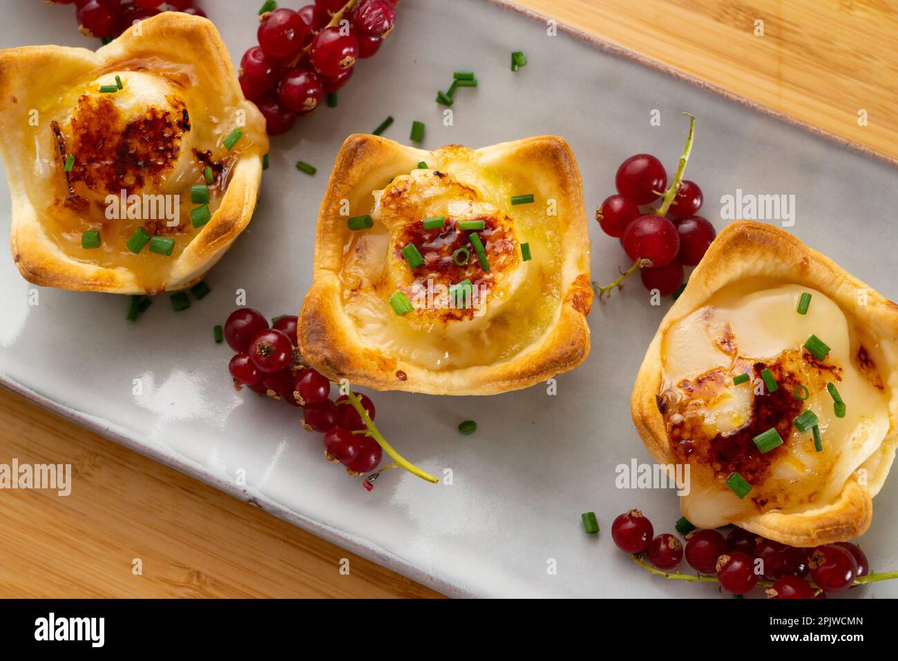 Goat cheese appetizers on shortcrust pastry Stock Photo Alamy