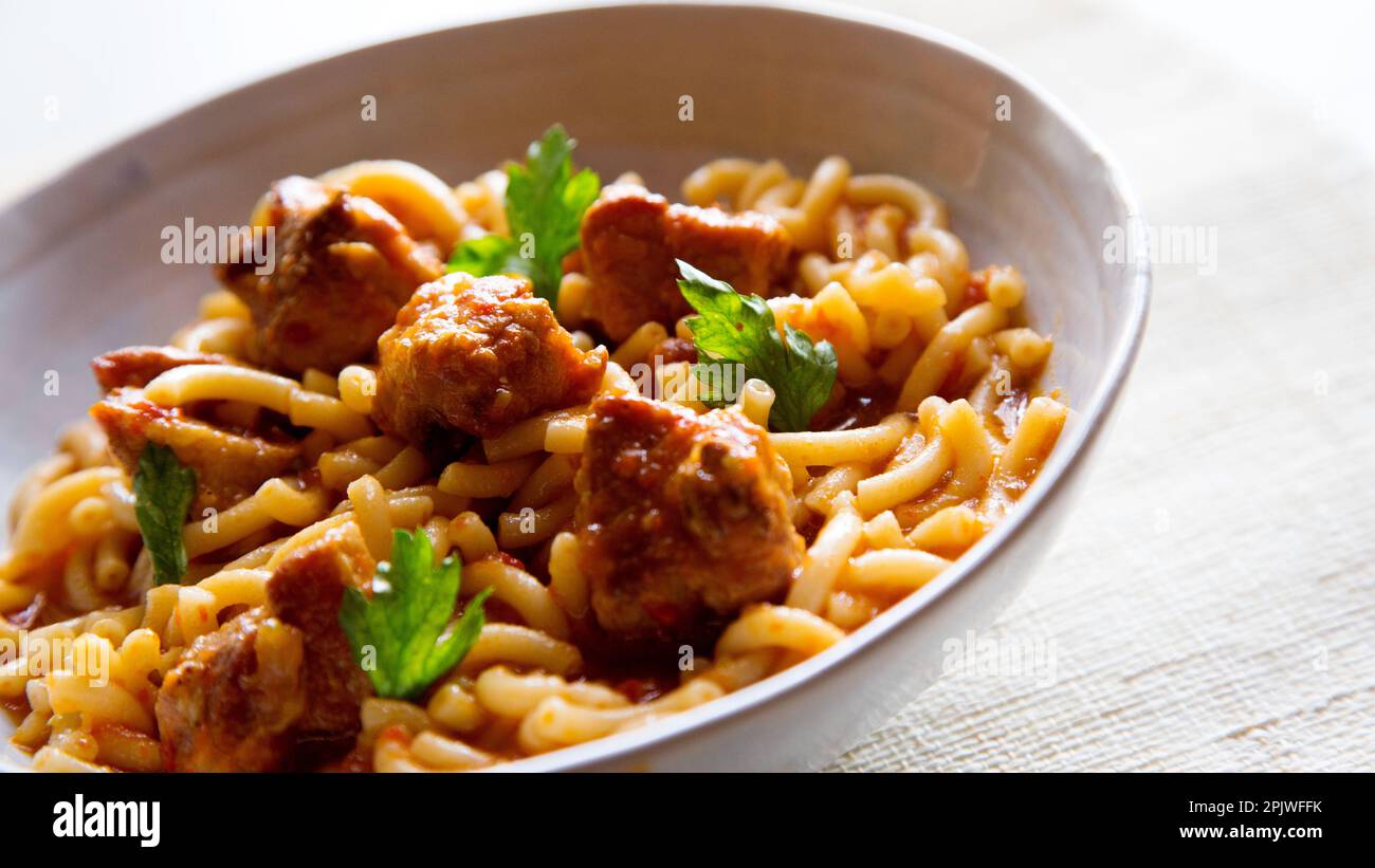 Casserole noodles with pork rib. Traditional Spanish tapa recipe cooked