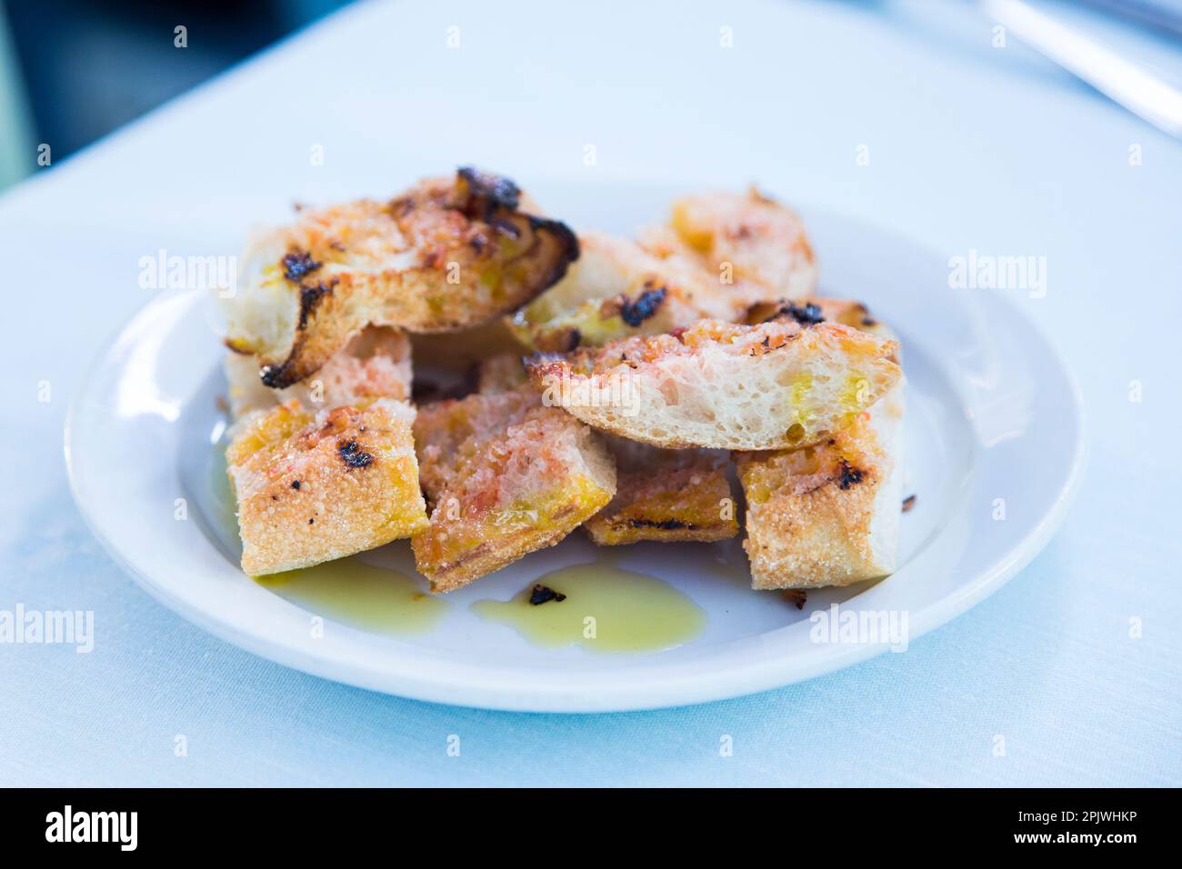 Toasted bread with tomato and oil. Traditional Spanish tapa Stock Photo