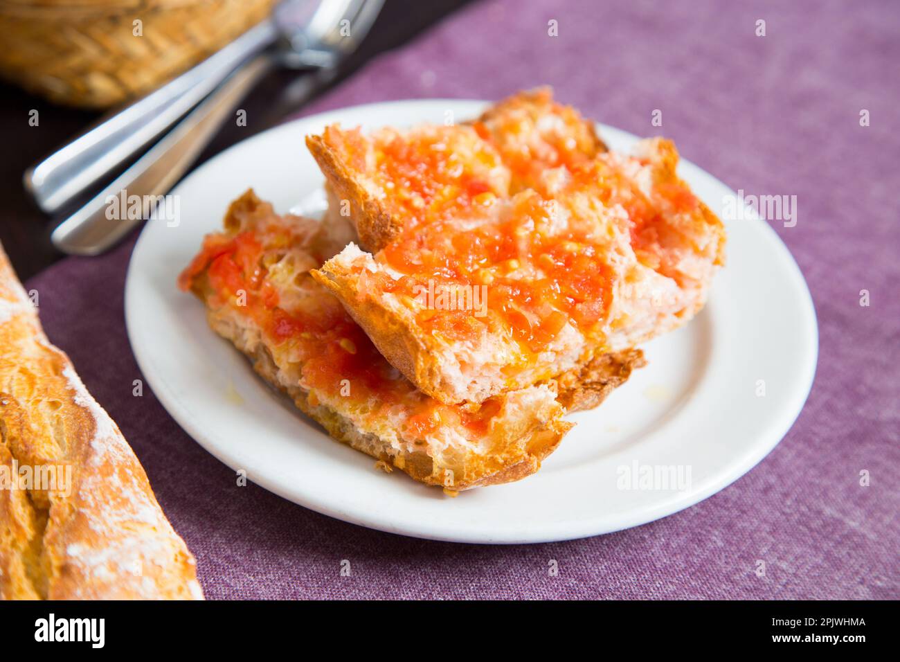 Toasted bread with tomato and oil. Traditional Spanish tapa Stock Photo ...