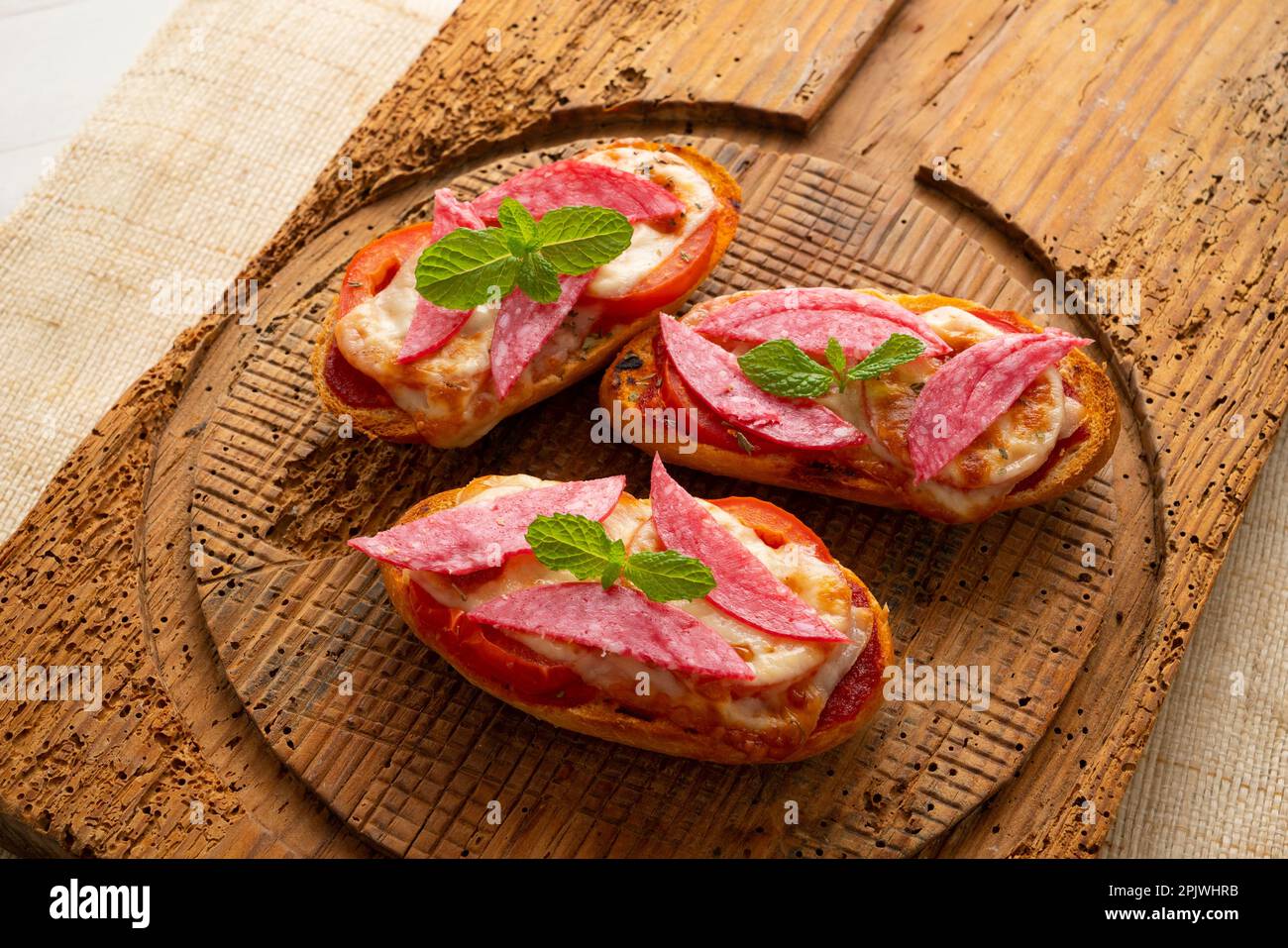 Salami panini with cheese. Italian appetizer. Stock Photo