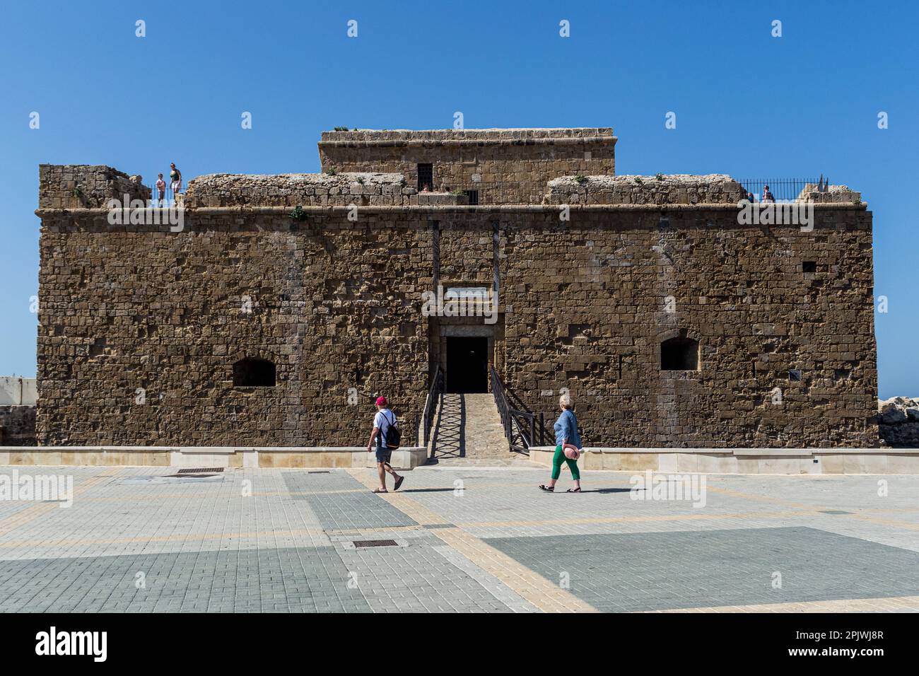 April 4, 2023, Paphos, Paphos, Cyprus: Tourists are seen in front of the castle at the port of Paphos. Cyprus sees massive increase in tourist arrivals in February with UK topping the list. Tourist arrivals in Cyprus increased by 65.6% year-on-year in February 2023. This fact, combined with the facts that Cyprus welcomed 3.2 million tourists last year, despite the absence of 800,000 Russian and Ukrainian tourists because of the war and that for 2022 it is estimated that tourists' spending has increased by about 13% on average for each trip, makes 2023 seem very promising. (Credit Image: © Kost Stock Photo