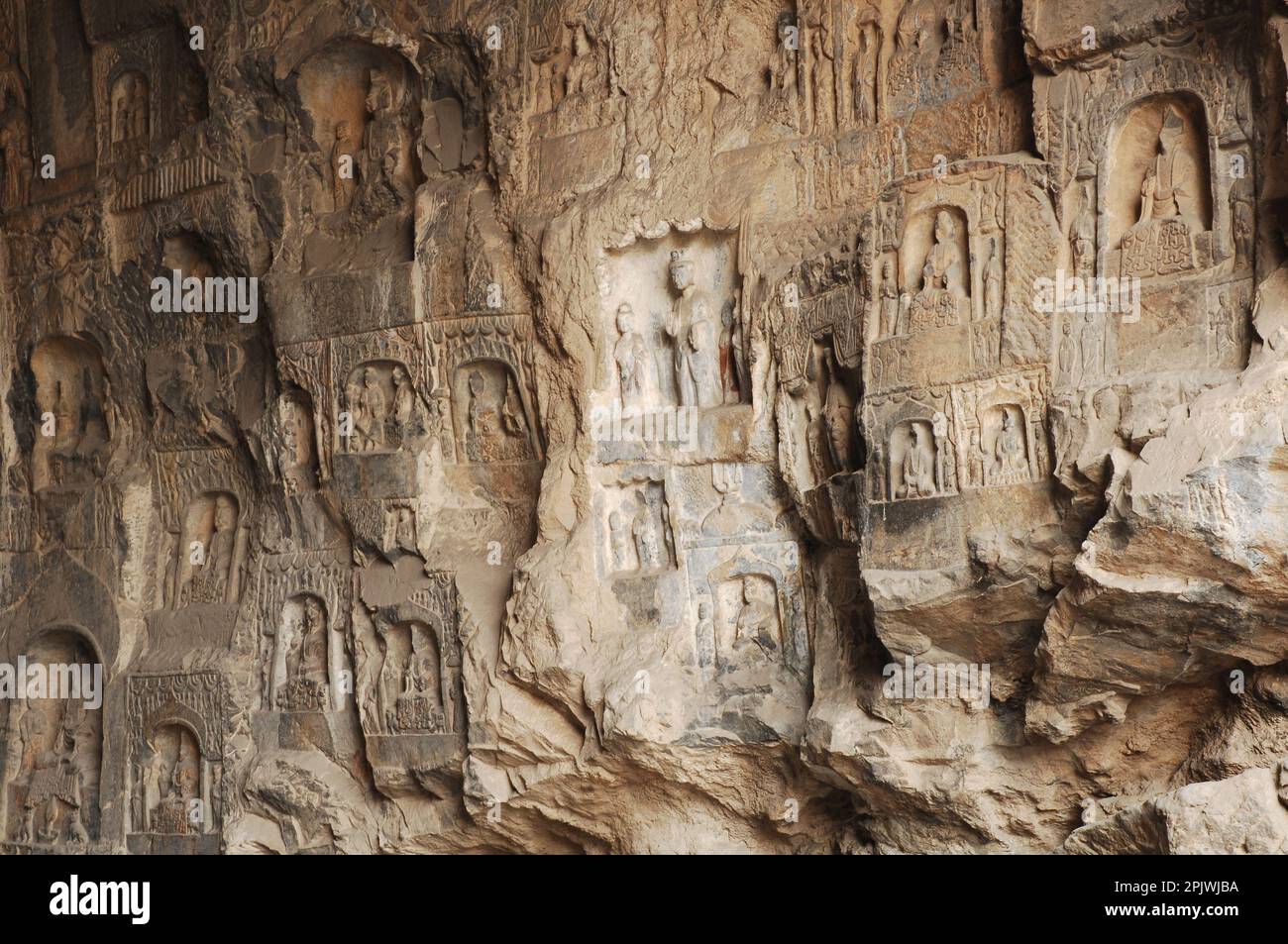 Longmen Grottoes, the rock-cut Buddhist temple, 5th-7th century AD. Henan, Luoyang, China Stock Photo