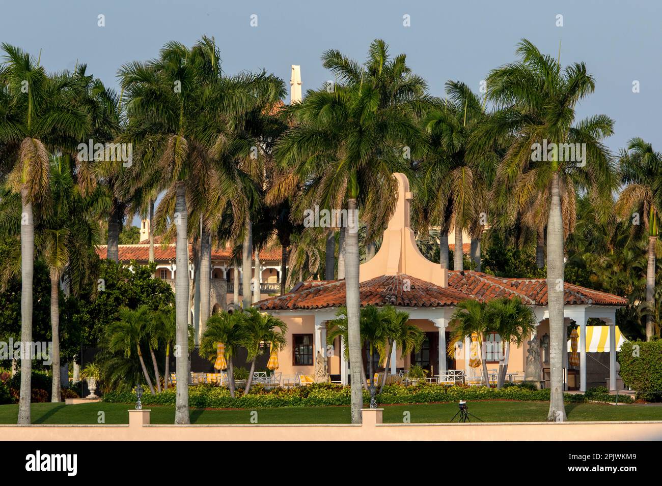 Mar-a-Lago. Former President Donald Trump arrives at Palm Beach International Airport as supporters wave signs and flags. The former President is on t Stock Photo