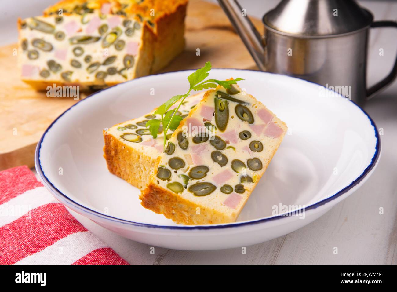 Egg pudding, green beans and baked ham Stock Photo Alamy