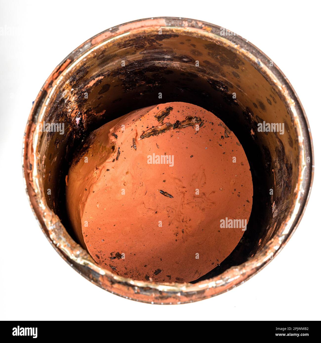 Emulsion paint gone hard in tin Stock Photo Alamy