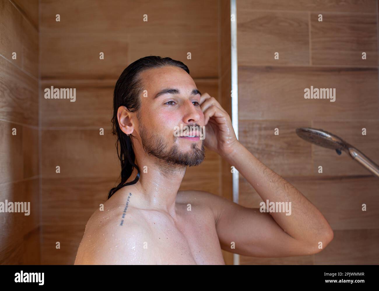 Long hair man showering hi-res stock photography and images - Alamy