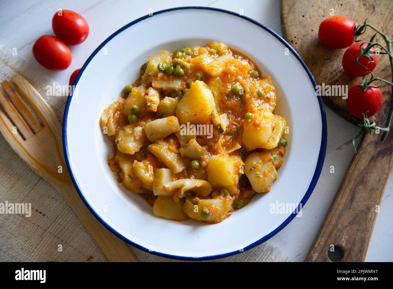 Stewed cuttlefish with potatoes. Traditional Spanish tapa recipe Stock