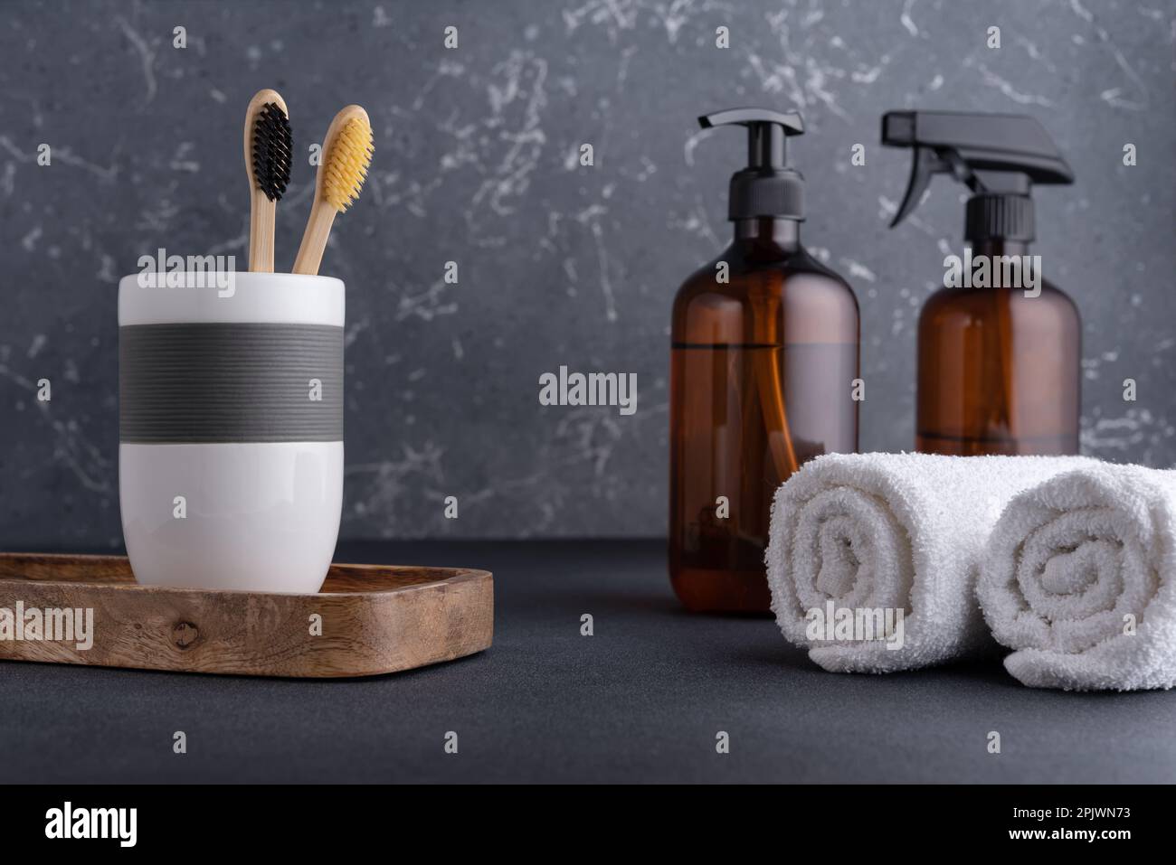Bathroom composition with bamboo toothbrushes and recycled cosmetic ...