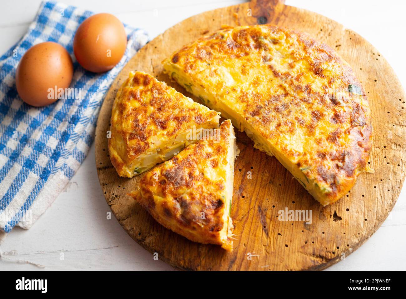 Tortillas de patatas traditional Spanish recipe with zucchini and eggs